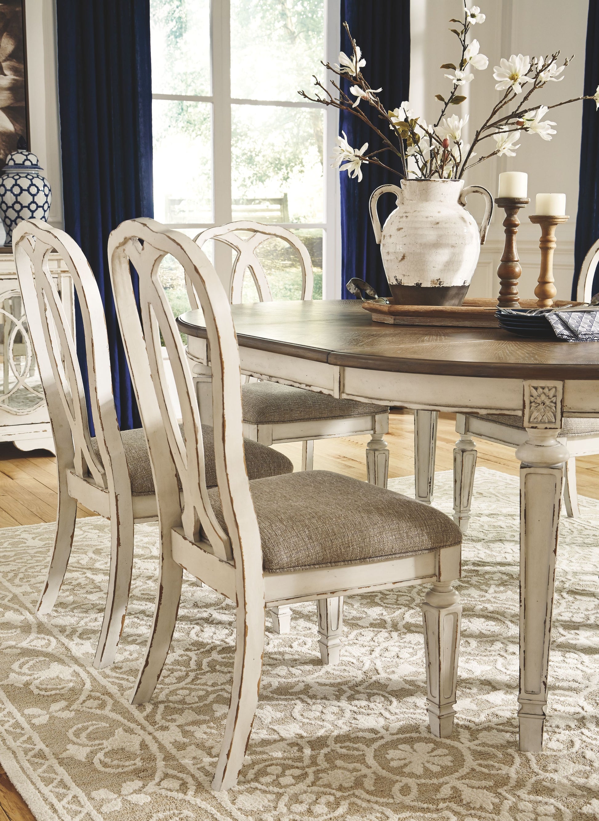 Realyn - Chipped White - Dining UPH Side Chair (Set of 2) - Ribbonback
